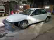 1999 Saturn SL with VIN 1G8ZH528XXZ235067, listed as a Copart auction lot 74508564 with 155,180 mi miles and Salvage title. Bid and sale history available at DreamBid. Image 1.