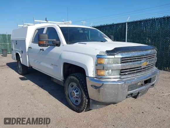 2015 Chevrolet Silverado 2500HD z VIN 1GB1KUE87FF512823, wystawiony jako IAAI lot #40921228 z przebiegiem 265 411 mil mil oraz . Historia ofert i sprzedaży dostępna na DreamBid. Obrazek 1.