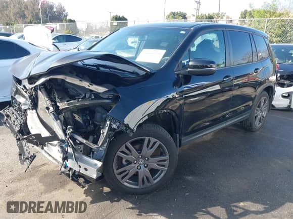 2021 Honda Passport EX-L with VIN 5FNYF7H5XMB013923, listed as a IAAI auction lot 41669295 with 42,969 mi miles and . Bid and sale history available at DreamBid. Image 16.