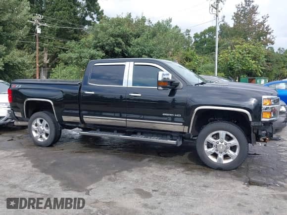 2019 Chevrolet Silverado 2500HD LTZ with VIN 1GC1KTEY7KF185131, listed as a IAAI auction lot 43354427 with 35,142 mi miles and . Bid and sale history available at DreamBid. Image 14.