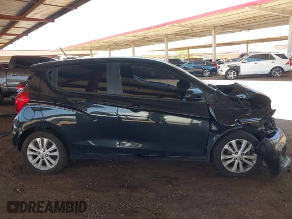 2016 Chevrolet Spark LT z VIN KL8CD6SA3GC631143, wystawiony jako IAAI lot #42791185 z przebiegiem 137 561 mil mil oraz . Historia ofert i sprzedaży dostępna na DreamBid. Obrazek 13.