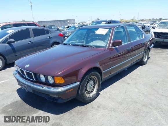 1993 BMW 7 Series with VIN WBAGD8327PDE87456, listed as a IAAI auction lot 42720246 with 143,502 mi miles and . Bid and sale history available at DreamBid. Image 2.