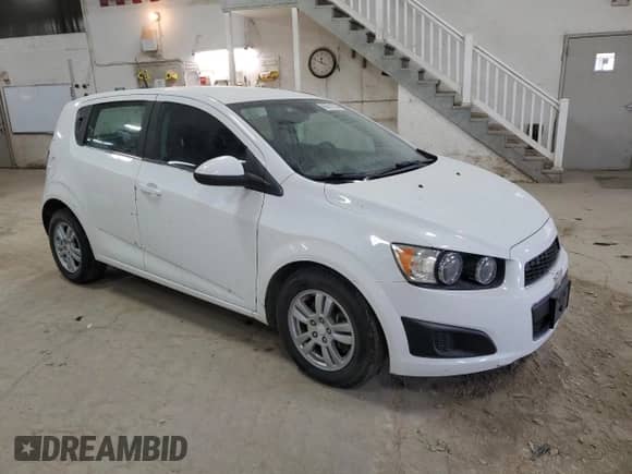 2012 Chevrolet Sonic LT with VIN 1G1JC6SB0C4213341, listed as a Copart auction lot 86681394 with 52,450 mi miles and Salvage title. Bid and sale history available at DreamBid. Image 4.