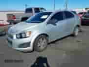 2013 Chevrolet Sonic LT with VIN 1G1JC5SH1D4114821, listed as a IAAI auction lot 43369517 with 152,476 mi miles and . Bid and sale history available at DreamBid. Image 2.