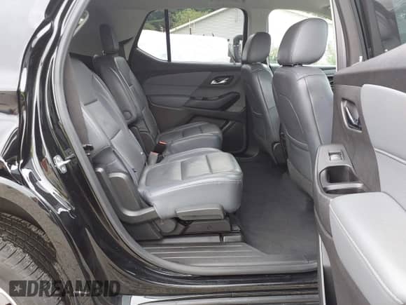 2018 Chevrolet Traverse Premier with VIN 1GNEVJKW4JJ256773, listed as a IAAI auction lot 43053281 with 116,244 mi miles and . Bid and sale history available at DreamBid. Image 8.