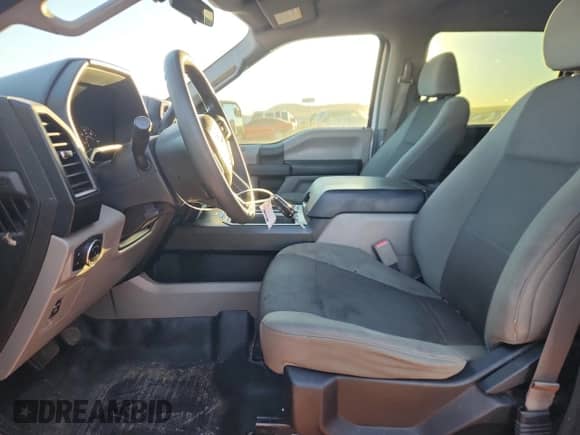 2016 Ford F-150 XLT with VIN 1FTEW1C84GKD24319, listed as a Copart auction lot 86672605 with 174,466 mi miles and Salvage title. Bid and sale history available at DreamBid. Image 7.