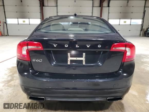 2014 Volvo S60 T5 z VIN YV1612FH9E2282760, wystawiony jako Copart lot #78427204 z przebiegiem 94 489 mil mil oraz Czysty tytuł • Clean title. Historia ofert i sprzedaży dostępna na DreamBid. Obrazek 6.