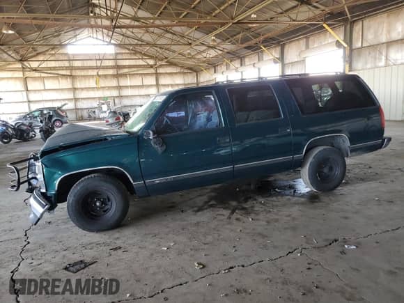 1997 Chevrolet Suburban z VIN 3GNEC16RXVG178307, wystawiony jako Copart lot #48878935 z przebiegiem 179 717 mil mil oraz Szkoda całkowita • Salvage title. Historia ofert i sprzedaży dostępna na DreamBid. Obrazek 1.