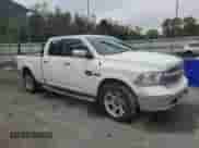 2015 Ram 1500 Laramie Limited with VIN 1C6RR7WM9FS761064, listed as a Copart auction lot 50032335 with 212,141 mi miles and Salvage title. Bid and sale history available at DreamBid. Image 4.