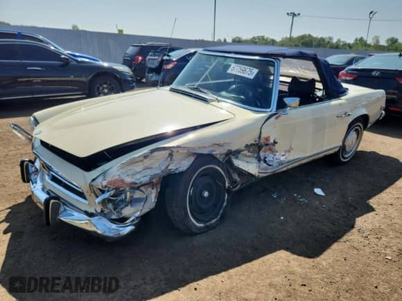 1971 Mercedes-Benz SL z VIN 11304412022259, wystawiony jako Copart lot #67759675 z przebiegiem 21 477 mil mil oraz Szkoda całkowita • Salvage title. Historia ofert i sprzedaży dostępna na DreamBid. Obrazek 1.