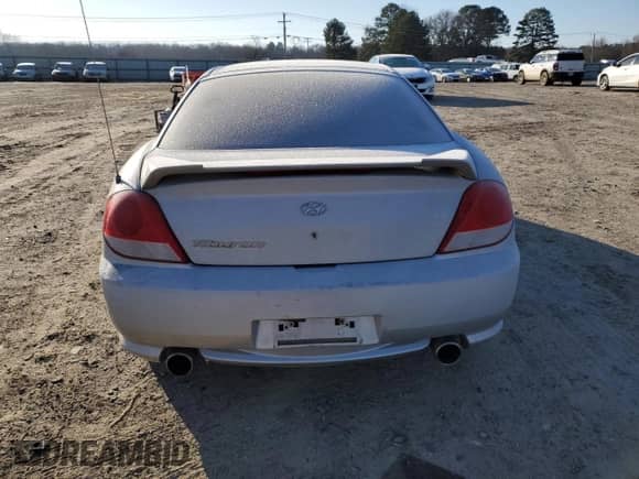 2006 Hyundai Tiburon GS с VIN KMHHM65D56U212346, выставлен на аукционе Copart как лот 87543845 с пробегом 181 605 миль миль и Чистый • Clean title. История ставок и продаж доступна на DreamBid. Изображение 6.