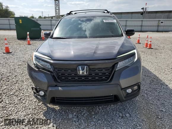 2020 Honda Passport Touring z VIN 5FNYF8H97LB015569, wystawiony jako Copart lot #80903265 z przebiegiem 66 050 mil mil oraz Szkoda całkowita • Salvage title. Historia ofert i sprzedaży dostępna na DreamBid. Obrazek 5.