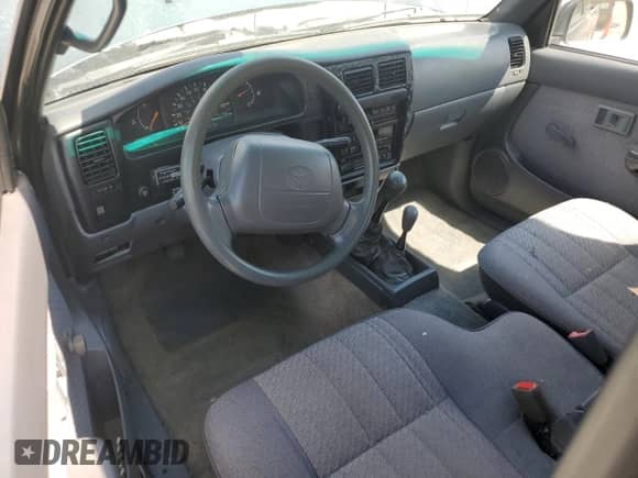 1997 Toyota Tacoma z VIN 4TAWN72N2VZ272710, wystawiony jako Copart lot #66575845 z przebiegiem 276 169 mil mil oraz Czysty tytuł • Clean title. Historia ofert i sprzedaży dostępna na DreamBid. Obrazek 8.