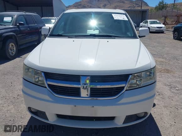 2009 Dodge Journey SXT z VIN 3D4GH57VX9T594749, wystawiony jako IAAI lot #42938171 z przebiegiem 216 081 mil mil oraz . Historia ofert i sprzedaży dostępna na DreamBid. Obrazek 6.