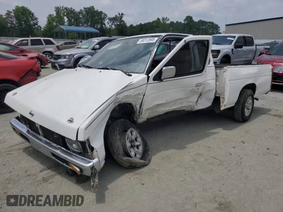 1996 Nissan Frontier XE with VIN 1N6SD16S6TC389626, listed as a Copart auction lot 59312595 with 210,292 mi miles and Salvage title. Bid and sale history available at DreamBid. Image 1.