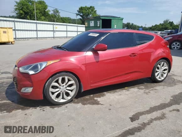 2015 Hyundai Veloster z VIN KMHTC6AD0FU238274, wystawiony jako Copart lot #65181205 z przebiegiem 143 112 mil mil oraz Czysty tytuł • Clean title. Historia ofert i sprzedaży dostępna na DreamBid. Obrazek 1.