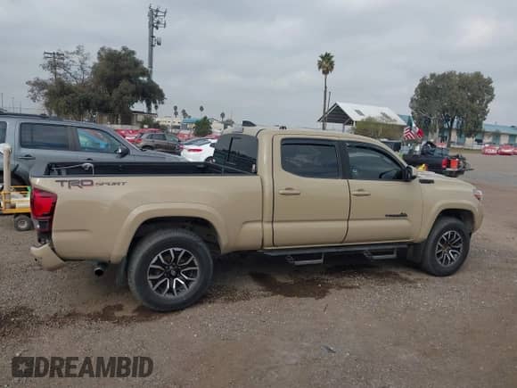 2020 Toyota Tacoma SR5 z VIN 3TMBZ5DN5LM026533, wystawiony jako IAAI lot #41529069 z przebiegiem 87 710 mil mil oraz . Historia ofert i sprzedaży dostępna na DreamBid. Obrazek 13.