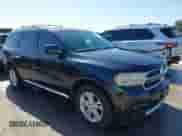 2013 Dodge Durango SXT with VIN 1C4RDHAGXDC680418, listed as a IAAI auction lot 42851105 with 149,216 mi miles and . Bid and sale history available at DreamBid. Image 1.