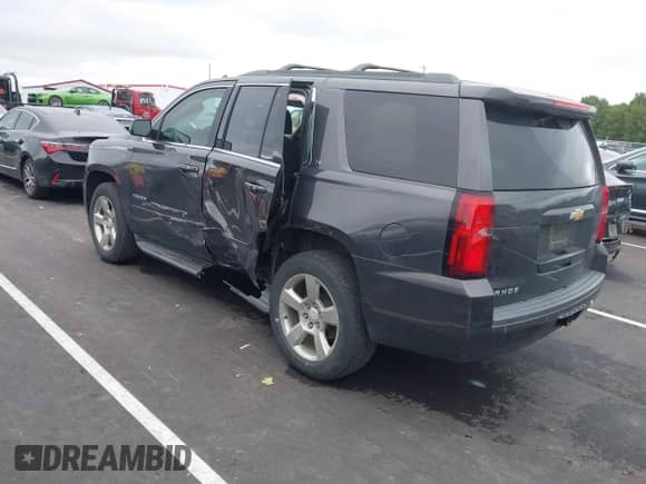 2017 Chevrolet Tahoe LT with VIN 1GNSKBKC1HR317645, listed as a IAAI auction lot 43184651 with 143,489 mi miles and . Bid and sale history available at DreamBid. Image 3.