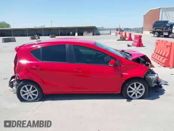 2014 Toyota Prius One z VIN JTDKDTB34E1069314, wystawiony jako IAAI lot #42018518 z przebiegiem 170 929 mil mil oraz . Historia ofert i sprzedaży dostępna na DreamBid. Obrazek 14.