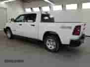 2025 Ram 1500 Tradesman with VIN 1C6RRFGG4SN674216, listed as a Copart auction lot 63827245 with 2,458 mi miles and Clean title. Bid and sale history available at DreamBid. Image 2.