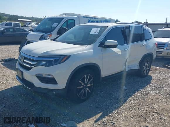 2017 Honda Pilot Touring with VIN 5FNYF6H94HB083565, listed as a IAAI auction lot 43341460 with 90,336 mi miles and . Bid and sale history available at DreamBid. Image 17.