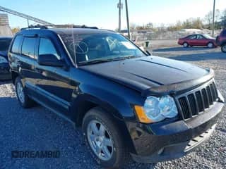2009 Jeep Grand Cherokee Laredo with VIN 1J8HR48P39C553005, listed as a IAAI auction lot 43491645 with 127,601 mi miles and . Bid and sale history available at DreamBid. Image 1.
