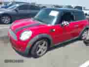 2008 MINI Hardtop with VIN WMWMF33538TT65157, listed as a IAAI auction lot 42587798 with 128,795 mi miles and . Bid and sale history available at DreamBid. Image 2.