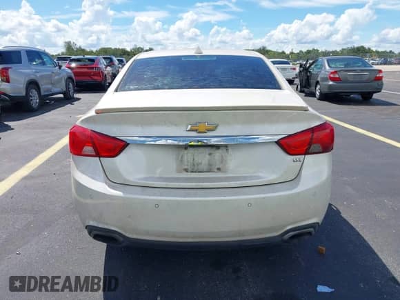 2014 Chevrolet Impala LTZ with VIN 1G1155S34EU115736, listed as a IAAI auction lot 43209560 with 160,081 mi miles and . Bid and sale history available at DreamBid. Image 16.