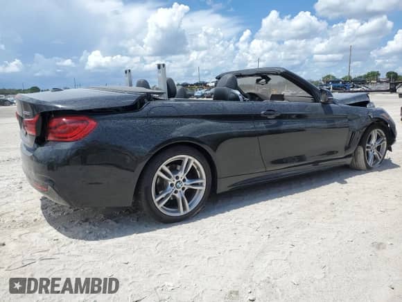2018 BMW 4 Series 430i with VIN WBA4Z1C50JEC70399, listed as a Copart auction lot 69543475 with Not provided miles and Salvage title. Bid and sale history available at DreamBid. Image 3.