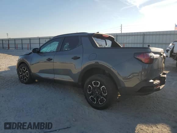 2023 Hyundai Santa Cruz SEL с VIN 5NTJCDAE7PH076424, выставлен на аукционе Copart как лот 81056155 с пробегом 23 761 миль миль и На запчасти • Non repairable. История ставок и продаж доступна на DreamBid. Изображение 2.