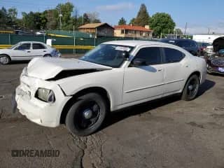 2008 Dodge Charger Police with VIN 2B3KA43H18H299375, listed as a Copart auction lot 61842855 with 135,593 mi miles and Salvage title. Bid and sale history available at DreamBid. Image 1.