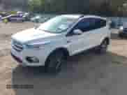 2017 Ford Escape SE with VIN 1FMCU9G94HUB77175, listed as a IAAI auction lot 43359533 with 153,347 mi miles and . Bid and sale history available at DreamBid. Image 2.