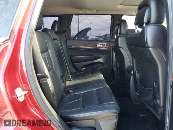 2013 Jeep Grand Cherokee Limited с VIN 1C4RJEBG5DC656954, выставлен на аукционе Copart как лот 82373845 с пробегом 148 213 миль миль и Списание • Salvage title. История ставок и продаж доступна на DreamBid. Изображение 11.