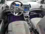 2015 Chevrolet Sonic LS with VIN 1G1JB5SH9F4157213, listed as a Copart auction lot 62529845 with 121,558 mi miles and Salvage title. Bid and sale history available at DreamBid. Image 8.