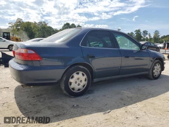 2000 Honda Accord LX с VIN JHMCG6657YC002058, выставлен на аукционе Copart как лот 81542345 с пробегом 219 197 миль миль и Списание • Salvage title. История ставок и продаж доступна на DreamBid. Изображение 3.