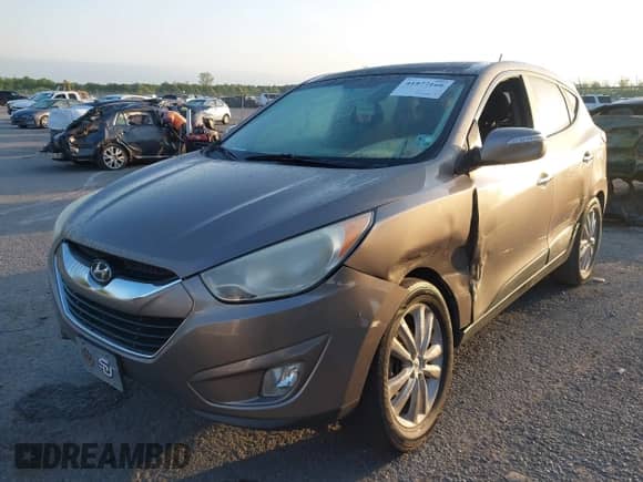 2013 Hyundai Tucson Limited с VIN KM8JU3AC8DU554268, выставлен на аукционе IAAI как лот 41977168 с пробегом 137 573 миль миль и . История ставок и продаж доступна на DreamBid. Изображение 2.