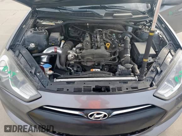 2014 Hyundai Genesis Coupe 2.0T with VIN KMHHT6KD8EU115406, listed as a Copart auction lot 71282465 with 136,065 mi miles and Salvage title. Bid and sale history available at DreamBid. Image 11.