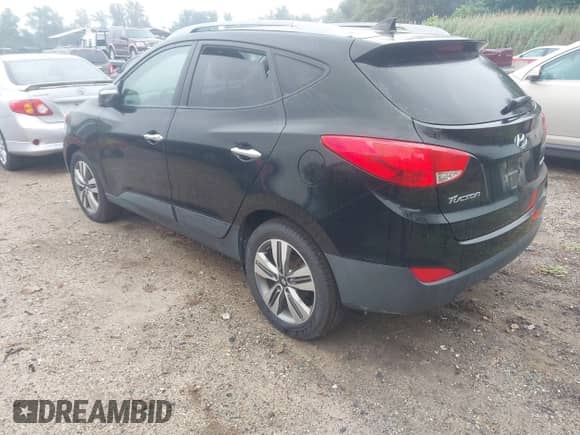2014 Hyundai Tucson Limited z VIN KM8JU3AG7EU848989, wystawiony jako IAAI lot #42610713 z przebiegiem 175 587 mil mil oraz . Historia ofert i sprzedaży dostępna na DreamBid. Obrazek 3.