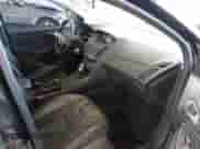 2015 Ford Focus SE z VIN 1FADP3K2XFL306875, wystawiony jako IAAI lot #43368410 z przebiegiem 220 758 mil mil oraz . Historia ofert i sprzedaży dostępna na DreamBid. Obrazek 5.