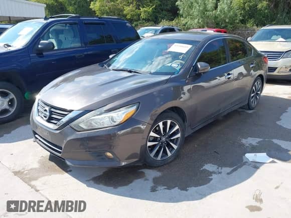 2016 Nissan Altima S z VIN 1N4AL3AP2GC133382, wystawiony jako IAAI lot #43350605 z przebiegiem 122 529 mil mil oraz . Historia ofert i sprzedaży dostępna na DreamBid. Obrazek 2.