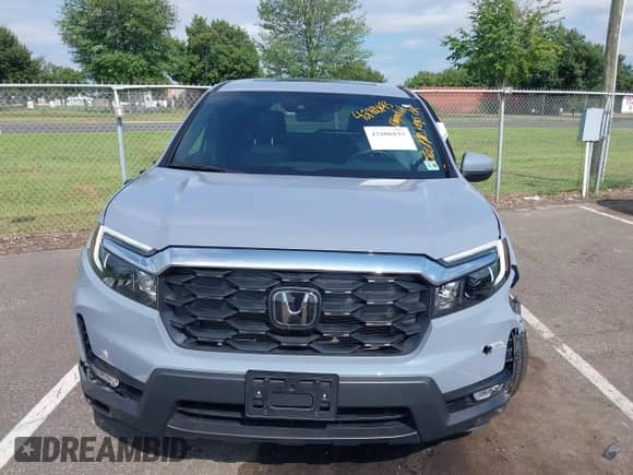 2025 Honda Passport EX-L with VIN 5FNYF8H54SB009658, listed as a IAAI auction lot 42800193 with 8,822 mi miles and . Bid and sale history available at DreamBid. Image 12.