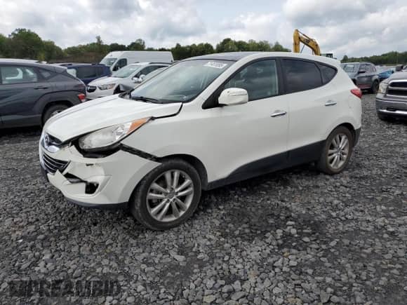 2012 Hyundai Tucson GLS with VIN KM8JUCAC4CU369021, listed as a Copart auction lot 71451095 with 167,485 mi miles and Salvage title. Bid and sale history available at DreamBid. Image 1.