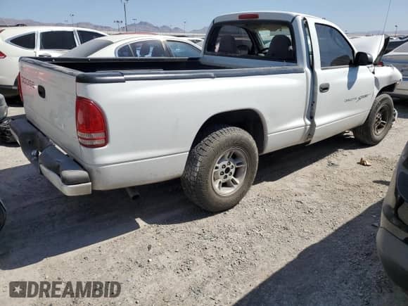 2000 Dodge Dakota с VIN 1B7FL26X8YS588909, выставлен на аукционе Copart как лот 52428235 с пробегом 156 894 миль миль и Чистый • Clean title. История ставок и продаж доступна на DreamBid. Изображение 3.