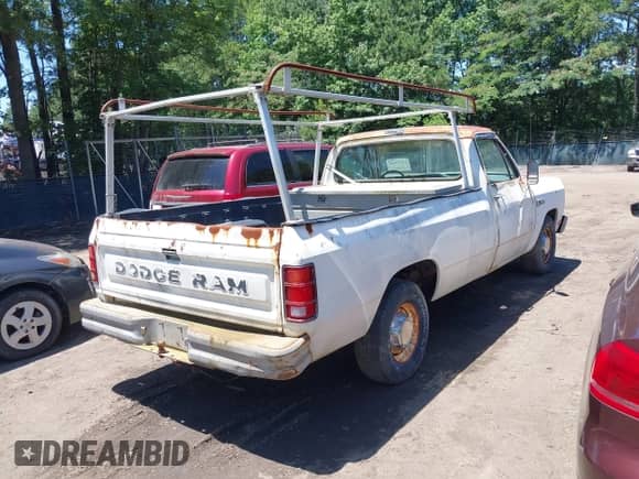 1987 Dodge Trucks with VIN 1B7HD14TXHS389456, listed as a IAAI auction lot 42523478 with 74,306 mi miles and . Bid and sale history available at DreamBid. Image 4.