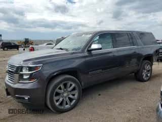 2018 Chevrolet Suburban Premier with VIN 1GNSKJKC8JR224217, listed as a Copart auction lot 70680615 with 90,157 mi miles and Salvage title. Bid and sale history available at DreamBid. Image 1.