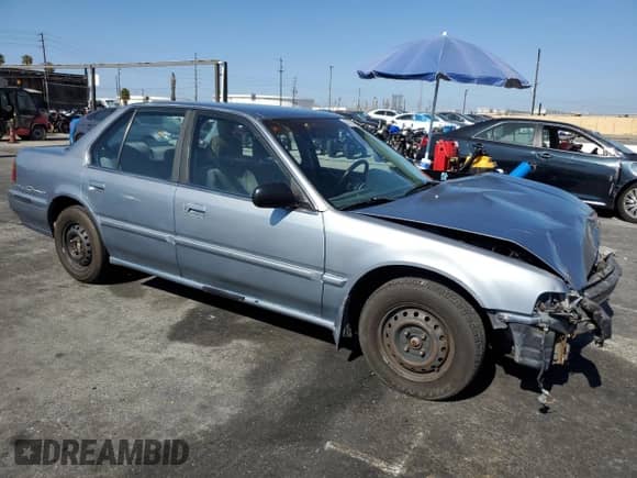 1990 Honda Accord LX with VIN JHMCB7652LC076386, listed as a Copart auction lot 57727165 with 245,375 mi miles and Salvage title. Bid and sale history available at DreamBid. Image 4.