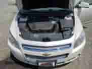 2010 Chevrolet Malibu LTZ with VIN 1G1ZE5E74AF325107, listed as a Copart auction lot 63506735 with 144,876 mi miles and Salvage title. Bid and sale history available at DreamBid. Image 11.