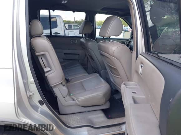 2009 Honda Pilot Touring with VIN 5FNYF38829B024103, listed as a IAAI auction lot 43415873 with 258,158 mi miles and . Bid and sale history available at DreamBid. Image 8.