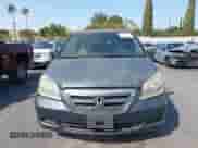 2006 Honda Odyssey EX z VIN 5FNRL38416B436826, wystawiony jako IAAI lot #43254317 z przebiegiem 162 845 mil mil oraz . Historia ofert i sprzedaży dostępna na DreamBid. Obrazek 13.